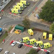 Aerial photograph of ambulance queueing outside of the James Paget University Hospital