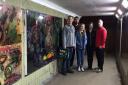 Street art designed by young people in Thetford has been put back up after being targeted by vandals. Pictured are Thetford Police Cadets, Chief Inspector Paul Wheatley and Acting Inspectors Mike Andrews and Laura Symonds. Picture: @BrecklandPolice