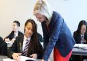 Elizabeth Truss MP talks to Year 8 student Mya Bailey during a visit to Thetford Academy. Picture: Thetford Academy/Inspiration Trust