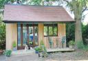A garden office creates a useful space while being separate from the main house. Picture Garden Room Design