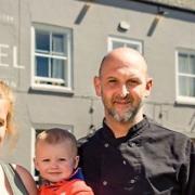 Emily Phipps with son and Richard Crouch outside The Angel in Watlington. Picture: Emily Phipps