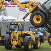 The 2018 East Anglian Game and Country Fair taking place on the Euston Estate. The JCB Dancing Diggers display in the main arena. Photo : Steve Adams