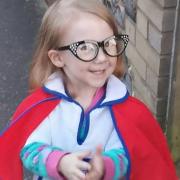 Harper Knight, two, has been dressing up as key workers for the clap for carers. Here she is pictured as Doctor Harper in her nurse's uniform at Thursday's clap. Picture: Anna Knight