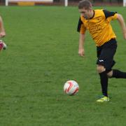 Robbie Harris in action for Fakenham Town earlier this season. Picture: TONY MILES
