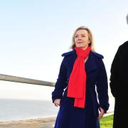 Liz Truss, pictured at Scratby, Norfolk, during her time as environment secretary in 2014, along with Great Yarmouth MP Brandon Lewis.