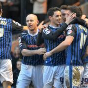 Ian Henderson celebrates a goal with his Rochdale team-mates. Picture: Manchester Evening News.
