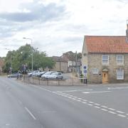 A three-vehicle crash closed part of a road in Norwich Road, Thetford
