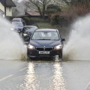 A Suffolk County Council meeting has heard that the backlog of road flooding problems could take 10 years to fix