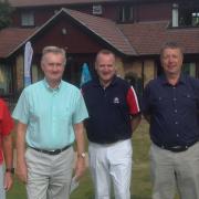 Pictured are the winning team of the Seniors Am-Am competition Graham Vandervord, Paul Sandfield, Tony Carman and Mike Moore on either side of Thetford vice-captain Rob Mill.