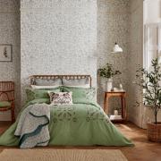 Use a green, nature-inspired bedding set like this one from Aldiss to create a tranquil sleeping space