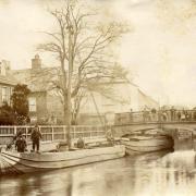 Postcard showing lighters on the river in Thetford