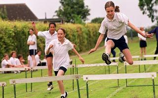 Year 7 girls hurdles race at Acle high school sports day in 1999.
