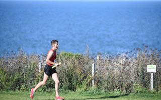 Ben Collinson on the 1st leg of the Round Norfolk Relay in Old Hunstanton. Picture: Ian Burt